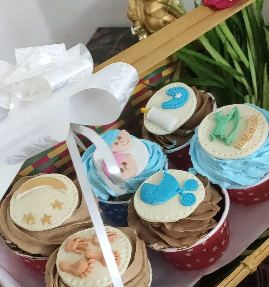 Themed cupcakes in a gift basket