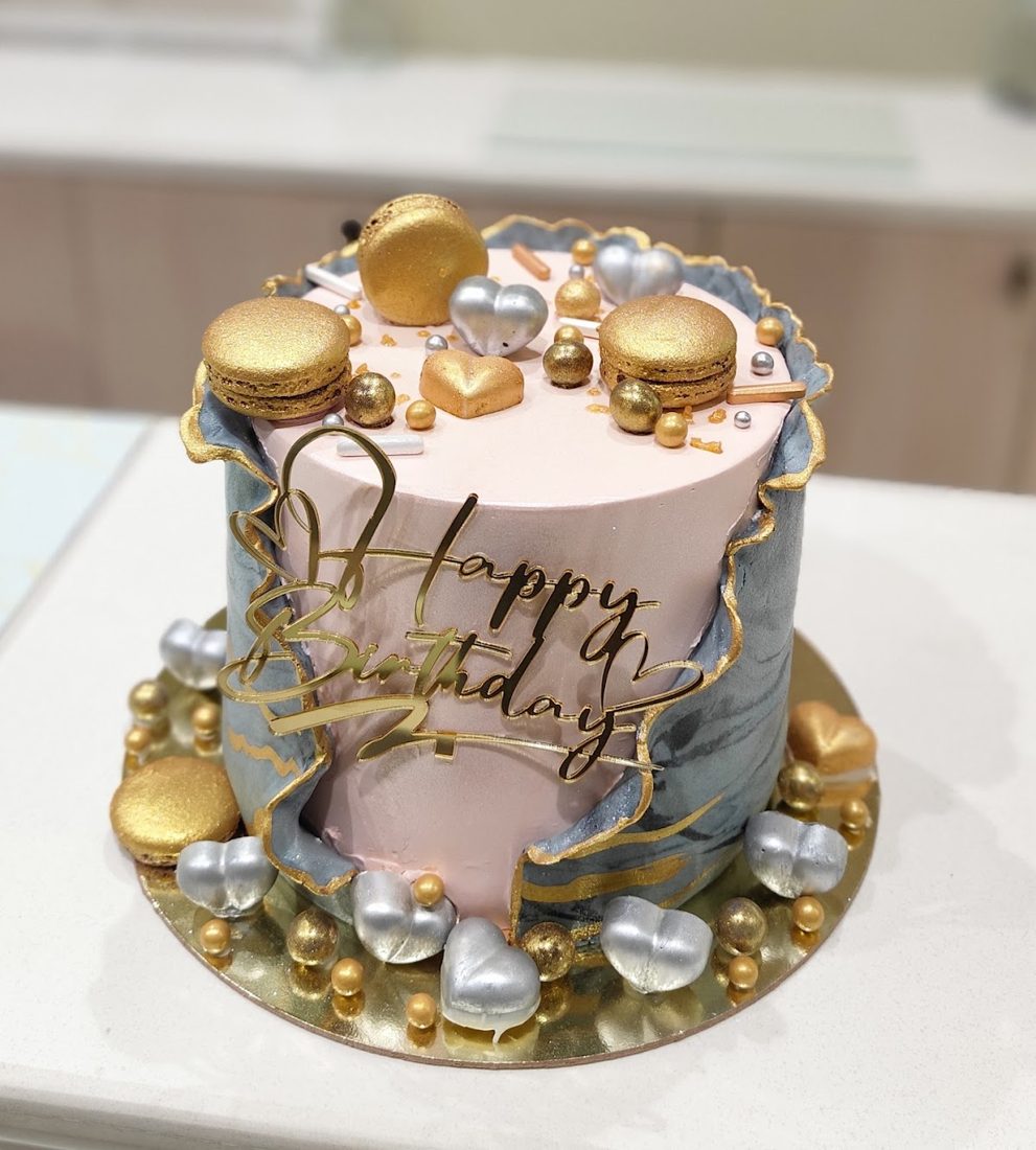 Gold macaron birthday cake